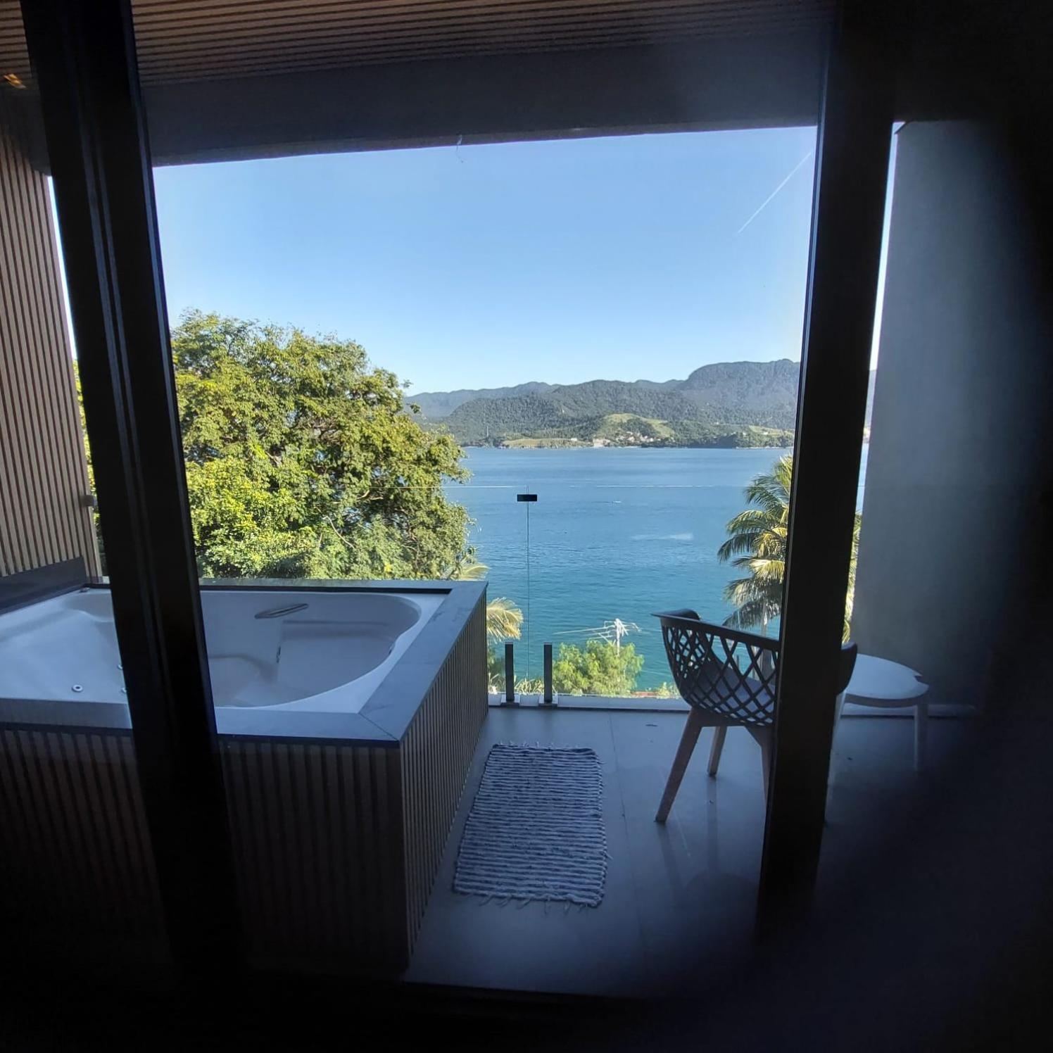 Suites Na Casa Da Praia Ильябела Номер фото