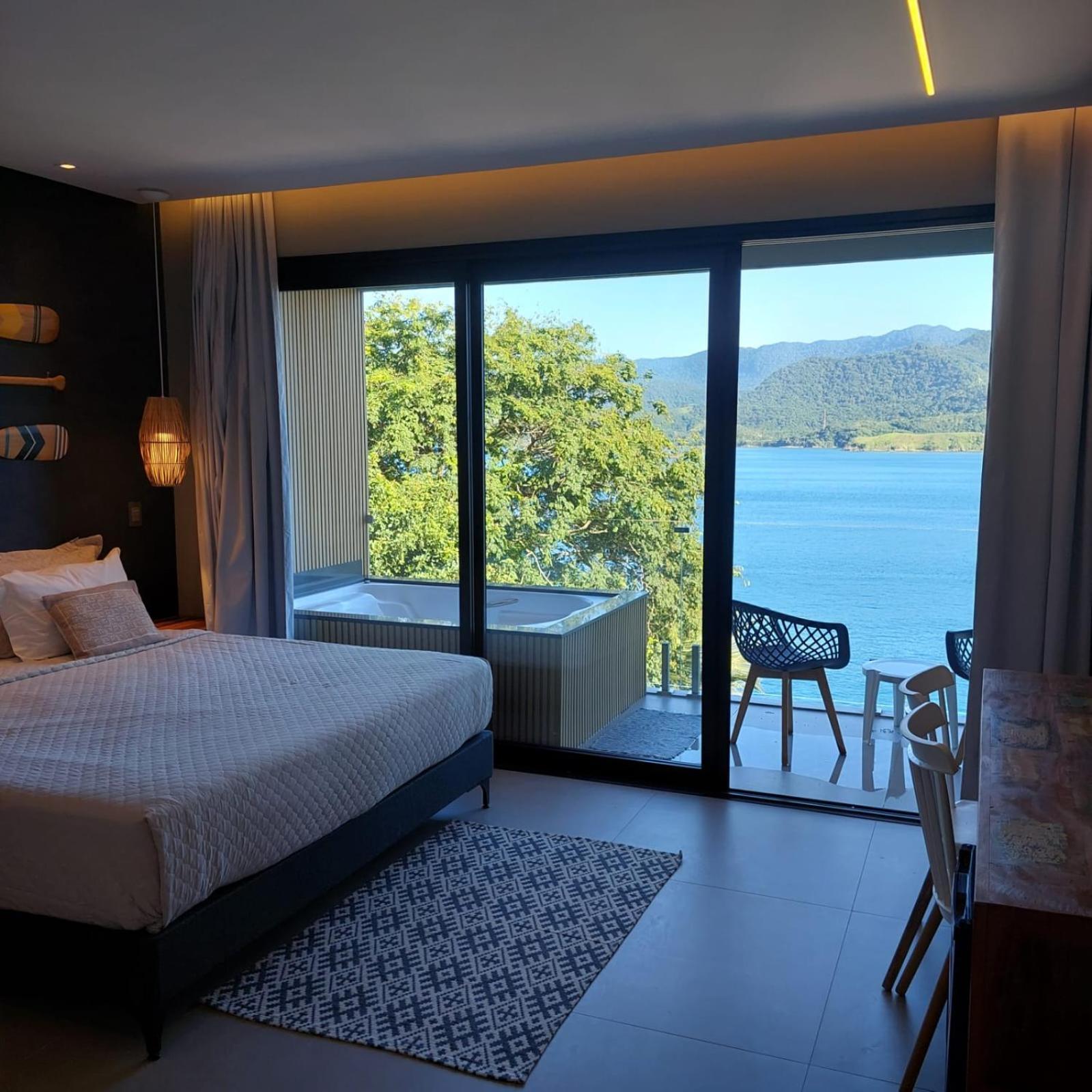 Suites Na Casa Da Praia Ильябела Номер фото
