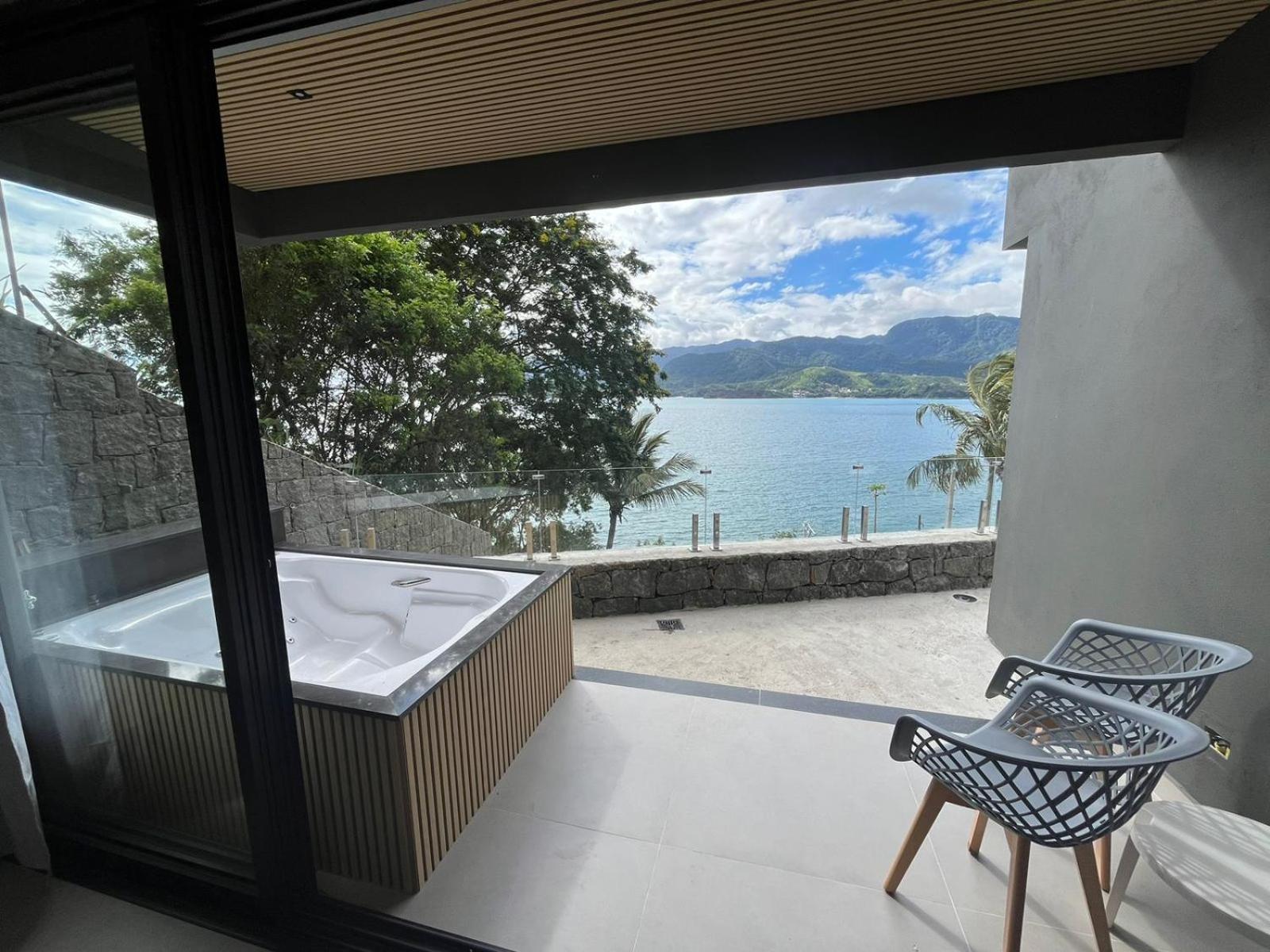 Suites Na Casa Da Praia Ильябела Номер фото