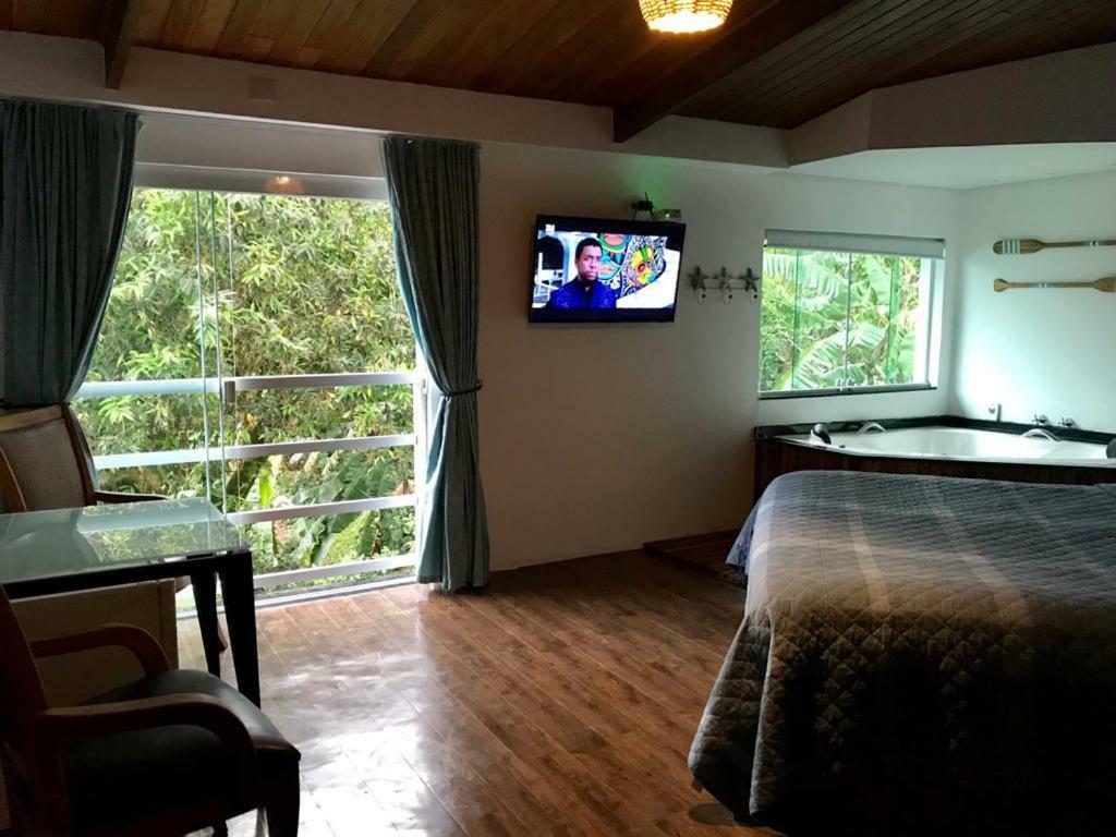 Suites Na Casa Da Praia Ильябела Экстерьер фото